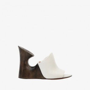 Lady's Alaia La Sculpture Mules In Calfskin & Wood