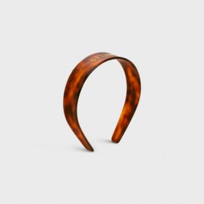 Lady's Celine Headband In Acetate And Steel