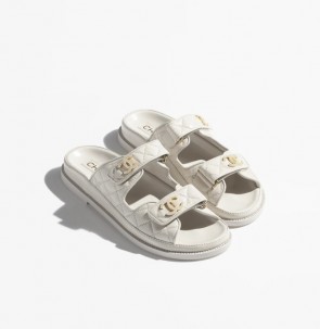 Lady's Chanel Mules in Ivory Shiny Lambskin