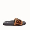 Women Brown leather and sheepskin slides 8X6638A3SMF13N9